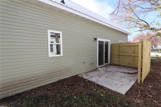 2805 Commercial Ave, Mattoon, IL 61938 - rear view of property featuring a patio area and a metal roof