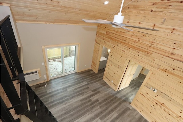 2805 Commercial Ave, Mattoon, IL 61938 - unfurnished living room with wooden walls, dark wood finished floors, wooden ceiling, a wall mounted AC, and high vaulted ceiling
