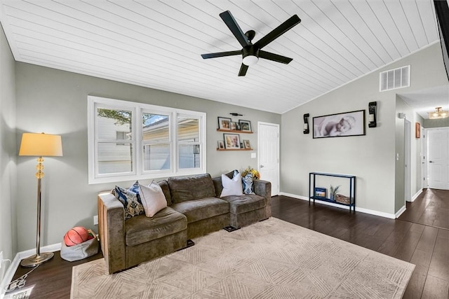 living area featuring baseboards, visible vents, vaulted ceiling, and dark wood finished floors