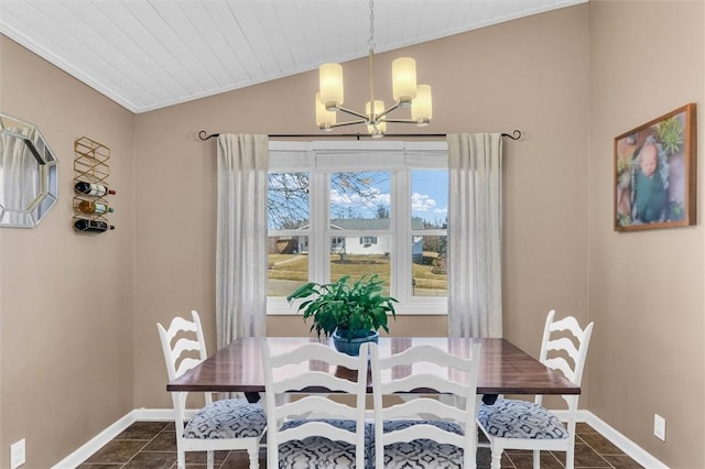 dining room with lofted ceiling, a chandelier, dark tile patterned flooring, wood ceiling, and baseboards