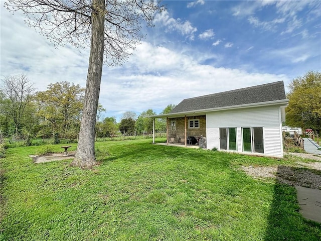 1625 Archer Ave, Marshall, IL 62441 - rear view of house with a patio area and a yard