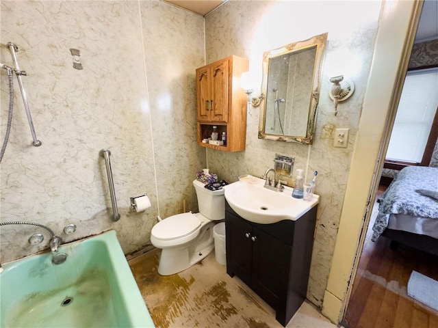 1625 Archer Ave, Marshall, IL 62441 - bathroom featuring vanity, connected bathroom, a bathtub, and toilet