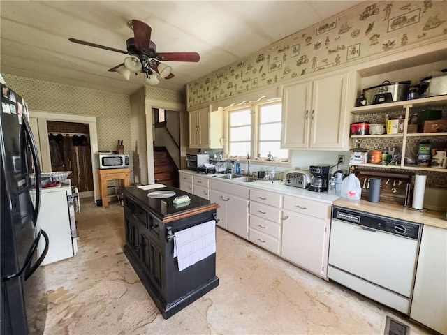 1625 Archer Ave, Marshall, IL 62441 - kitchen with black fridge with ice dispenser, wallpapered walls, stainless steel microwave, a sink, and dishwasher