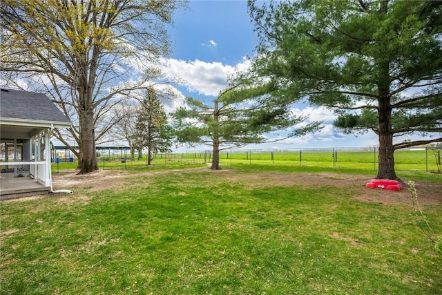view of yard featuring fence