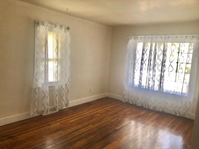 906 S 3rd St, Effingham, IL 62401 - unfurnished room with wood finished floors and healthy amount of natural light