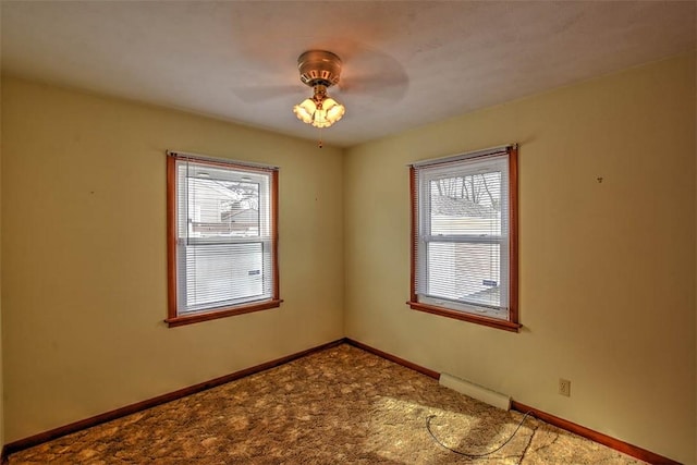 empty room featuring ceiling fan