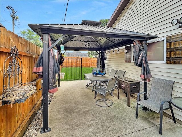 2321 Shelby Ave, Mattoon, IL 61938 - view of patio featuring a gazebo and outdoor dining area