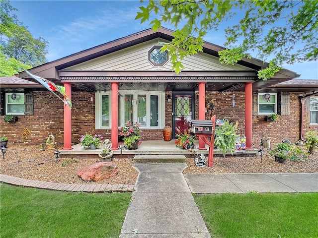 2321 Shelby Ave, Mattoon, IL 61938 - view of front of home with brick siding and covered porch