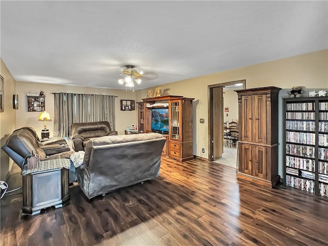 2321 Shelby Ave, Mattoon, IL 61938 - living area with dark wood-style floors and ceiling fan