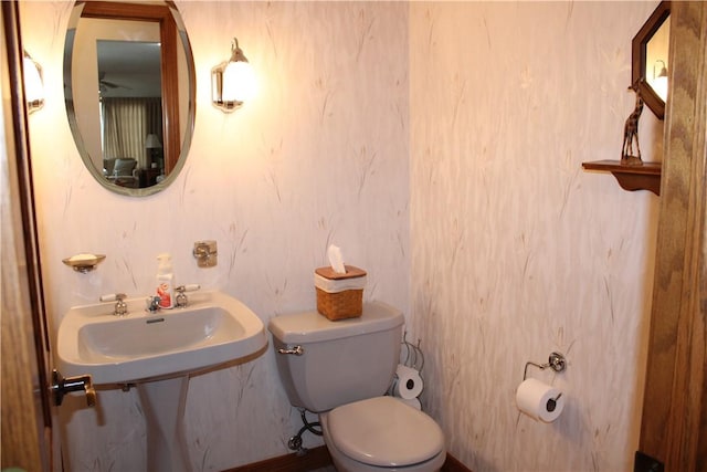 bathroom featuring a sink and toilet