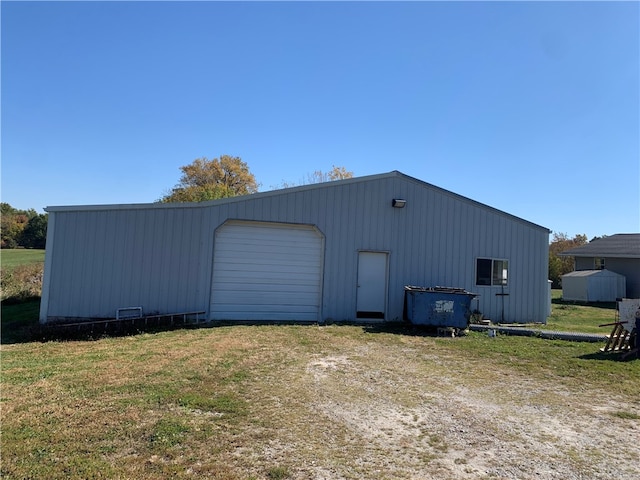 view of outbuilding with a garage