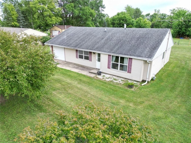 16 Franklin Rd, Bismarck, IL 61814 - ranch-style home featuring a shingled roof, a front lawn, and view of scattered trees