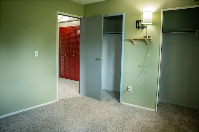 16 Franklin Rd, Bismarck, IL 61814 - unfurnished bedroom with carpet and multiple closets