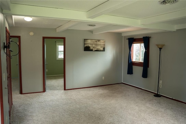 16 Franklin Rd, Bismarck, IL 61814 - carpeted spare room featuring plenty of natural light, beam ceiling, and a smoke detector