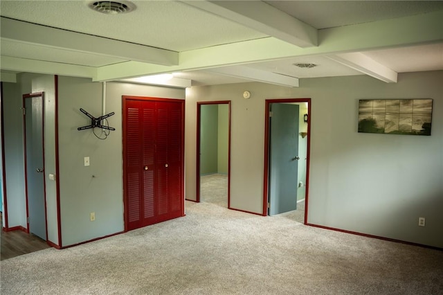 16 Franklin Rd, Bismarck, IL 61814 - unfurnished bedroom featuring carpet flooring and beam ceiling