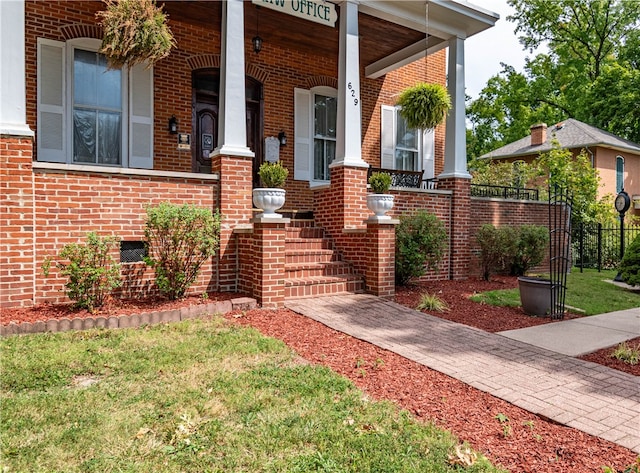 entrance to property with covered porch