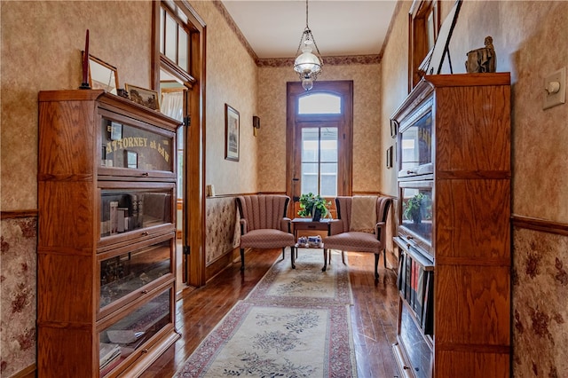 sitting room featuring hardwood / wood-style floors