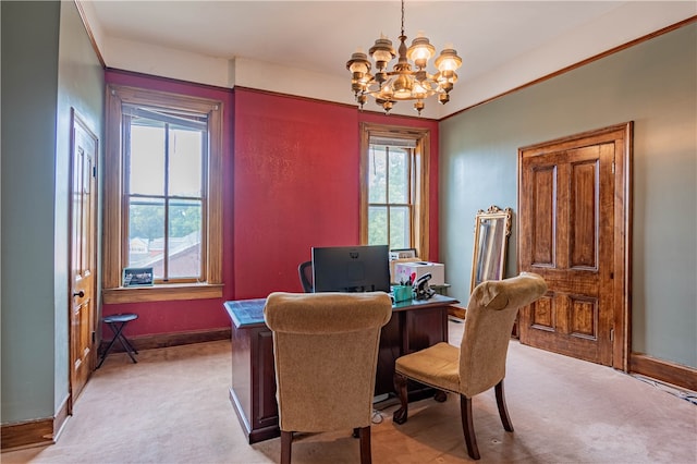 carpeted home office featuring a healthy amount of sunlight and an inviting chandelier