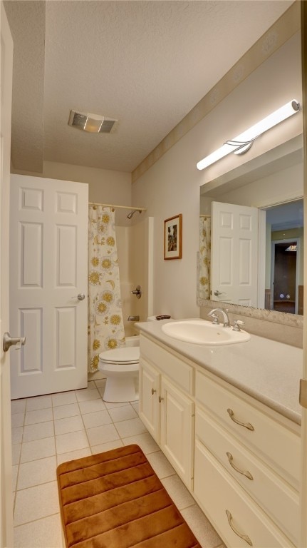 full bathroom featuring curtained shower, visible vents, toilet, vanity, and tile patterned flooring