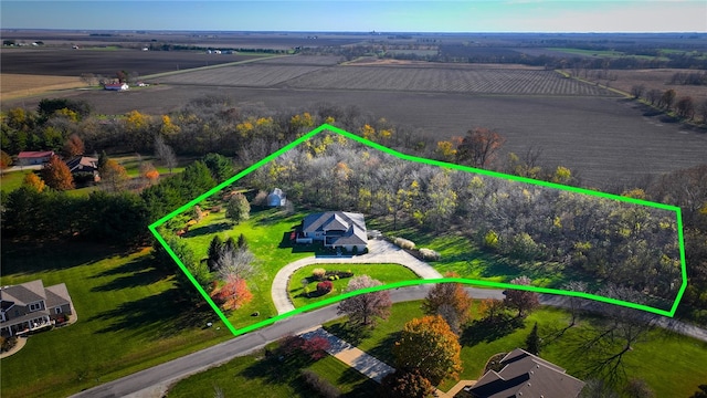 birds eye view of property featuring a rural view