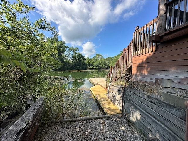 315 W Autumn Dr, Oakwood, IL 61858 - view of yard with a water view, stairway, and a boat dock