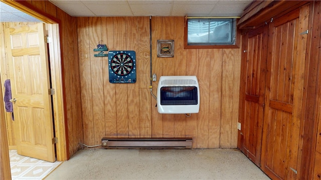 315 W Autumn Dr, Oakwood, IL 61858 - detailed view of heating unit, a baseboard radiator, and wood walls
