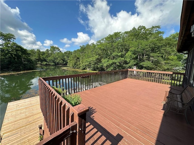 315 W Autumn Dr, Oakwood, IL 61858 - deck featuring a water view and a view of trees