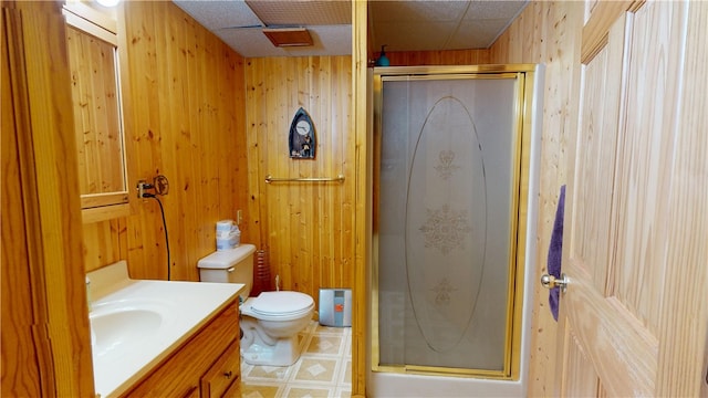 315 W Autumn Dr, Oakwood, IL 61858 - full bathroom featuring a shower stall, wood walls, vanity, and tile patterned floors