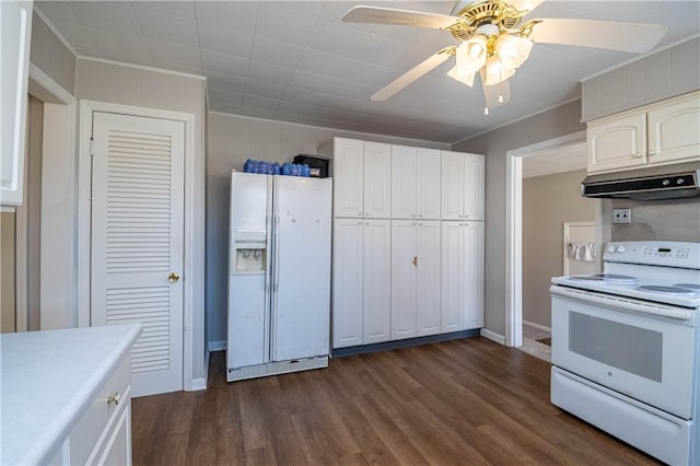 kitchen with under cabinet range hood, white appliances, white cabinets, and dark wood-style flooring