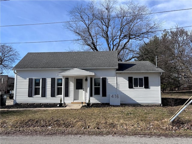 view of front of home featuring a shingled roof