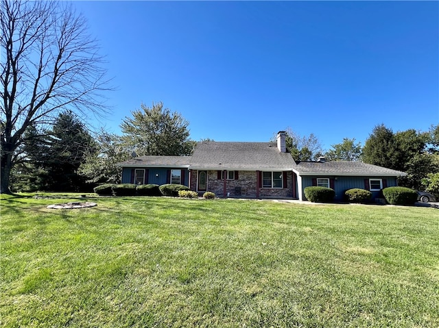 ranch-style house with a front lawn