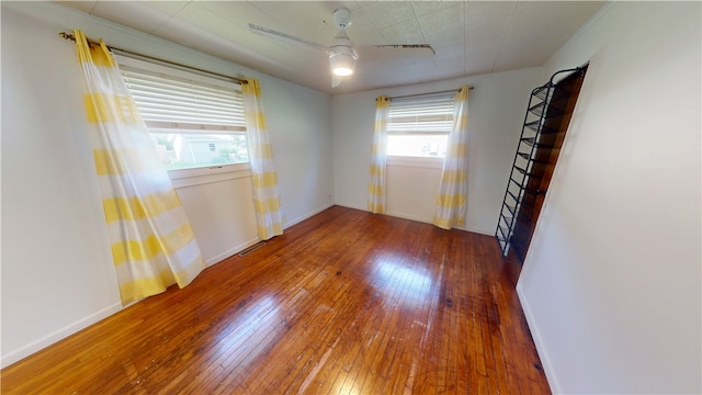 202 Lakeview Dr, Catlin, IL 61817 - empty room with hardwood / wood-style floors and ceiling fan