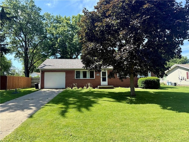 202 Lakeview Dr, Catlin, IL 61817 - view of front of house featuring brick siding, a garage, and driveway