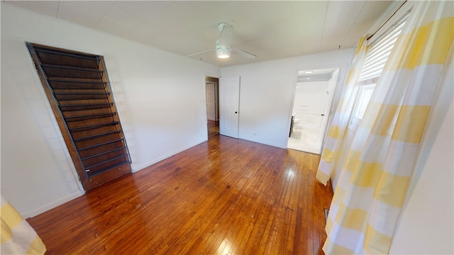 202 Lakeview Dr, Catlin, IL 61817 - unfurnished room with ceiling fan, hardwood / wood-style floors, and stairs