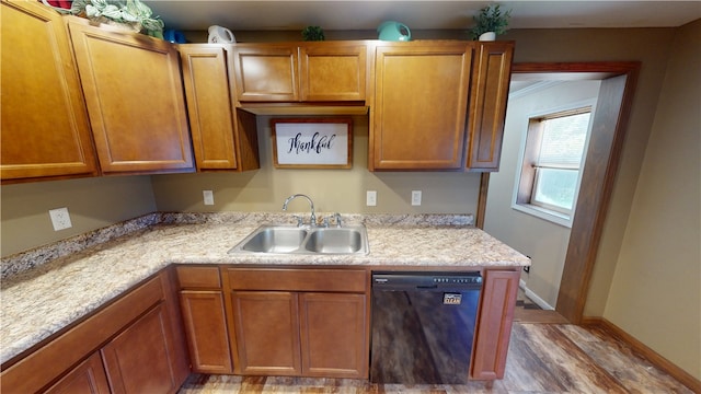 202 Lakeview Dr, Catlin, IL 61817 - kitchen featuring black dishwasher, light countertops, wood finished floors, and brown cabinets