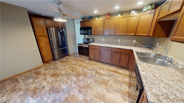 202 Lakeview Dr, Catlin, IL 61817 - kitchen featuring appliances with stainless steel finishes, ceiling fan, light countertops, brown cabinets, and recessed lighting