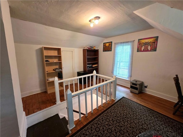 310 N Ellen St, Homer, IL 61849 - staircase featuring wood finished floors, lofted ceiling, and baseboards