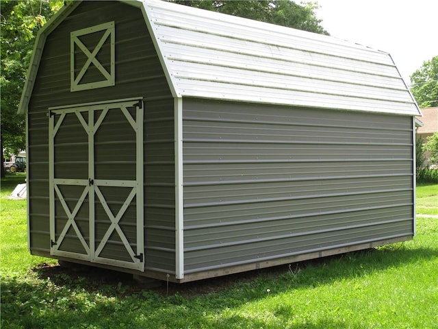 205 Franklin St, Pana, IL 62557 - view of barn with a lawn