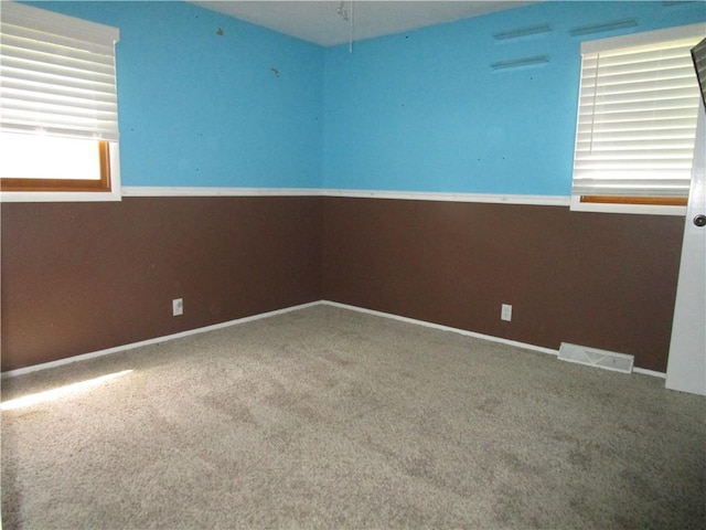 205 Franklin St, Pana, IL 62557 - carpeted spare room featuring baseboards