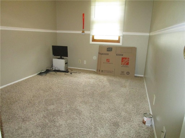 205 Franklin St, Pana, IL 62557 - empty room with carpet floors and baseboards