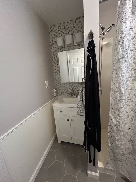 3221 E Lake Paradise Rd, Mattoon, IL 61938 - full bath with a walk in shower, vanity, and tile patterned floors