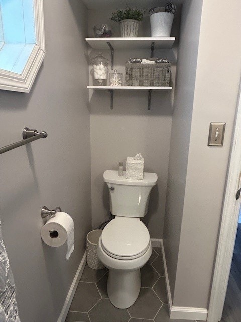 3221 E Lake Paradise Rd, Mattoon, IL 61938 - bathroom featuring toilet and tile patterned floors