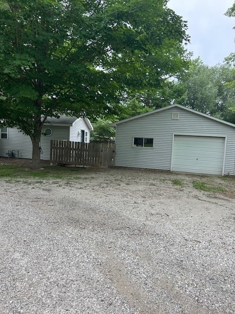 3221 E Lake Paradise Rd, Mattoon, IL 61938 - view of yard featuring a garage and an outdoor structure