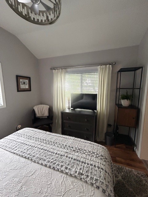 3221 E Lake Paradise Rd, Mattoon, IL 61938 - bedroom with vaulted ceiling and wood finished floors