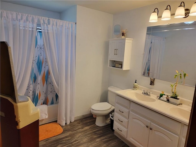 517 W Union St, Nokomis, IL 62075 - bathroom with wood finished floors, double vanity, and shower / tub combo with curtain