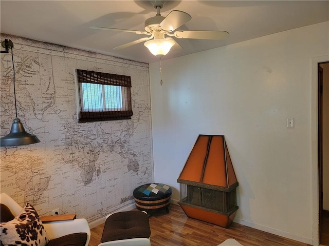517 W Union St, Nokomis, IL 62075 - sitting room with wood finished floors and ceiling fan