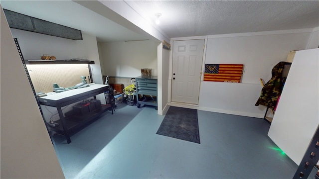 602 Maple Dr, Catlin, IL 61817 - foyer entrance with concrete flooring and a textured ceiling