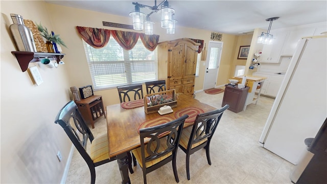 602 Maple Dr, Catlin, IL 61817 - dining space featuring baseboards and light flooring
