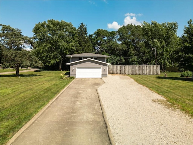 602 Maple Dr, Catlin, IL 61817 - view of front of property featuring concrete driveway and view of wooded area
