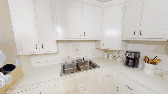 602 Maple Dr, Catlin, IL 61817 - kitchen featuring light countertops, white cabinets, and backsplash
